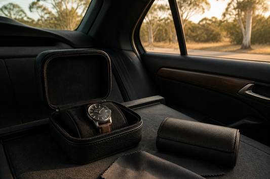 Watch case and watch roll packed in a shaded car interior for Australian road trip storage